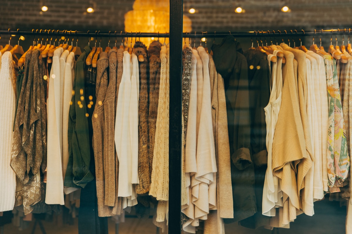 Clothing rack with garments in a boutique