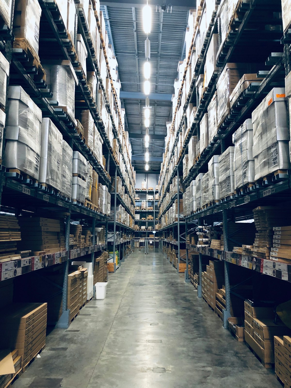 Expansive modern warehouse interior with high-bay pallet racking
